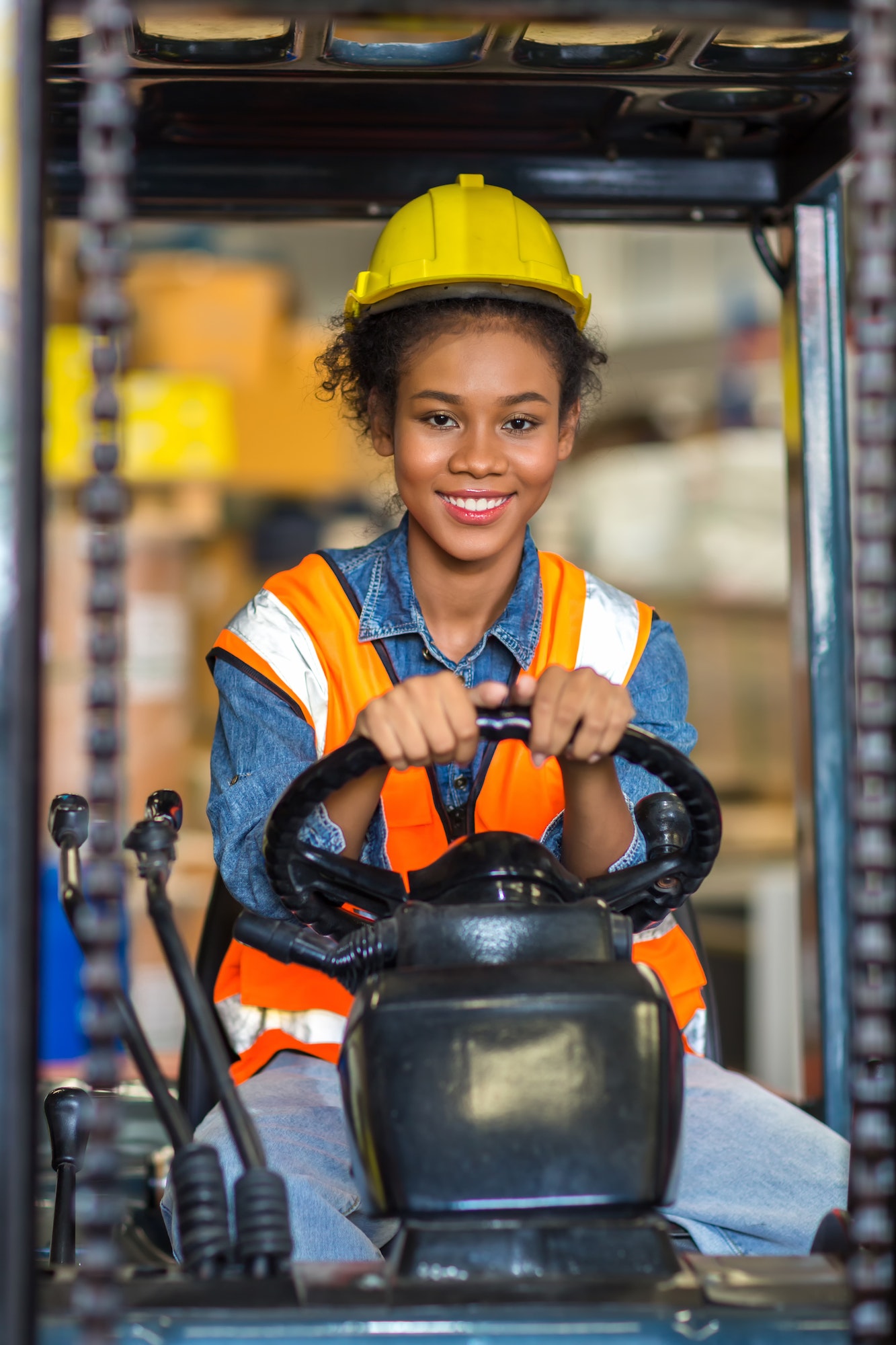women worker at forklift driver happy working in industry factory logistic ship .jpg